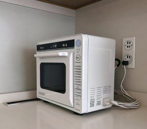 microwave connected to electric socket