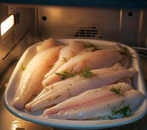 fish defrosting in microwave