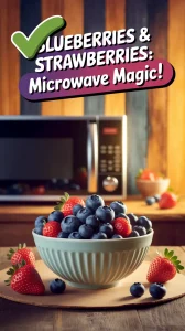 Bowl of blueberries and strawberries in the kitchen with a microwave, exploring if you can microwave blueberries and strawberries.