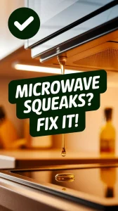 Food-grade oil being used to fix microwave hinge squeak